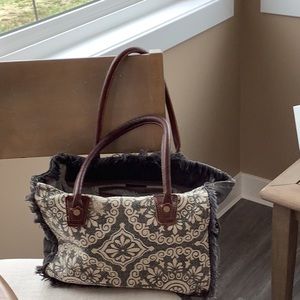 Myra Bag, lightly used, clean smoke free. Grey,tan, white .